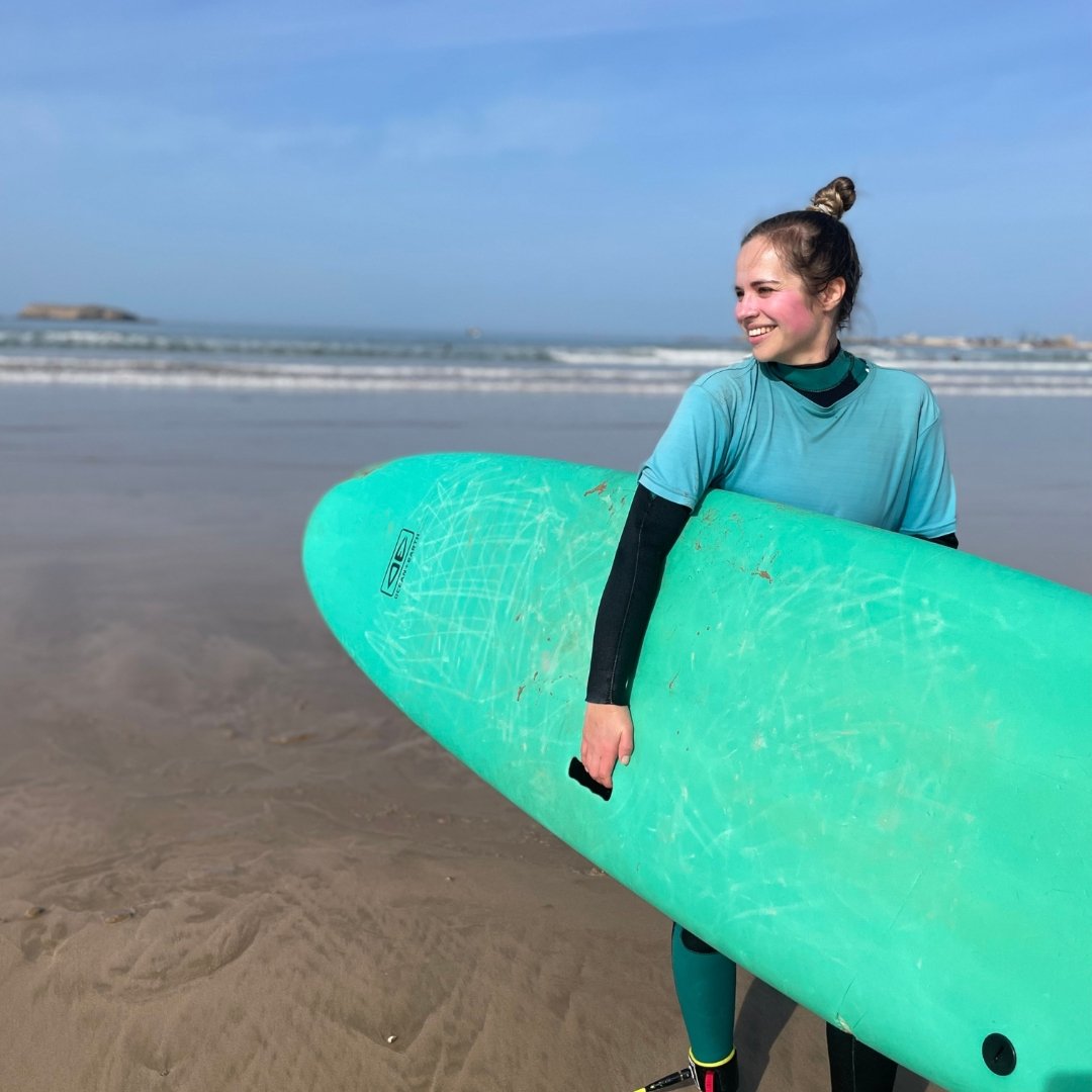 Solo female traveller after a private surf lesson in Essaouira