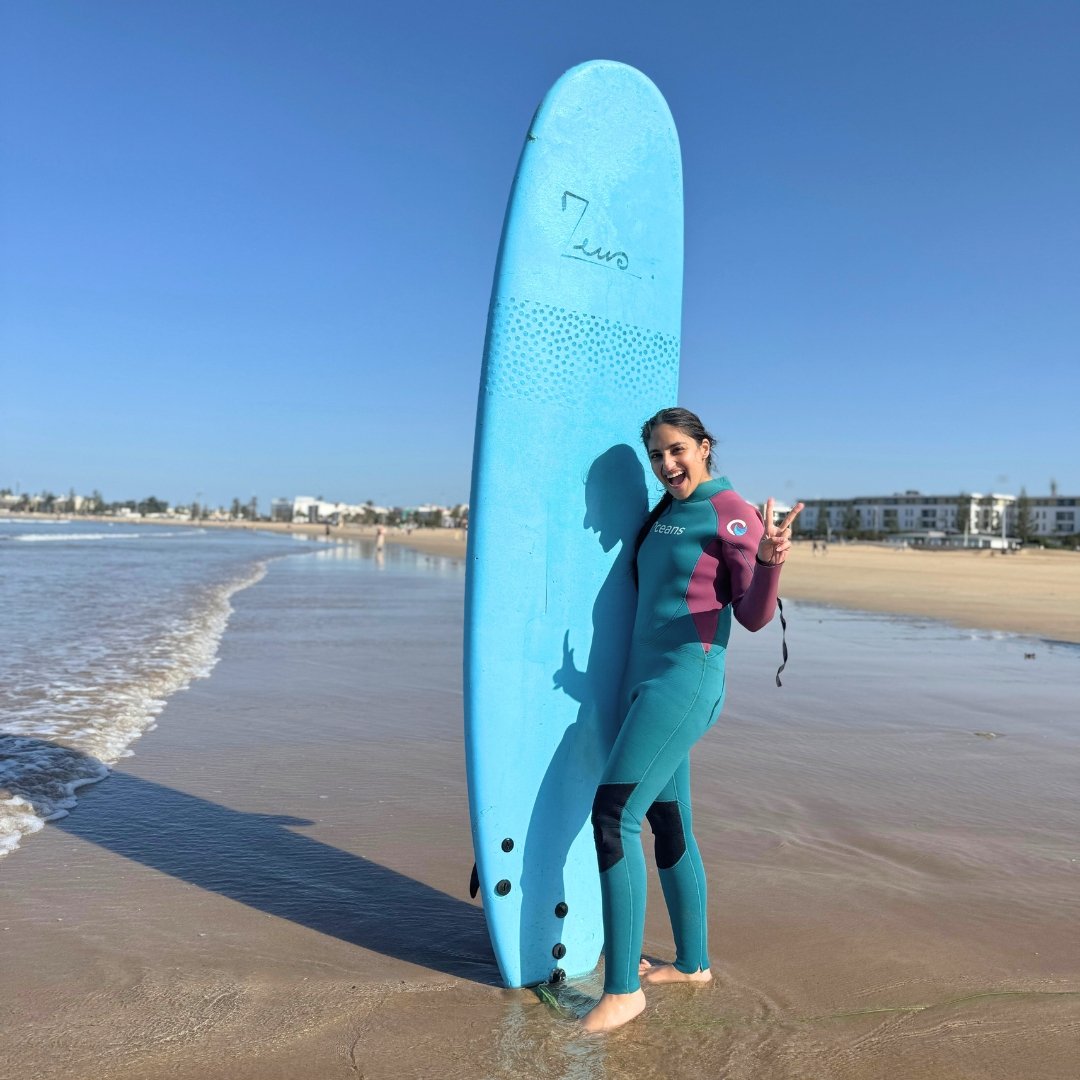 Solo female traveller after a private surf lesson in Essaouira