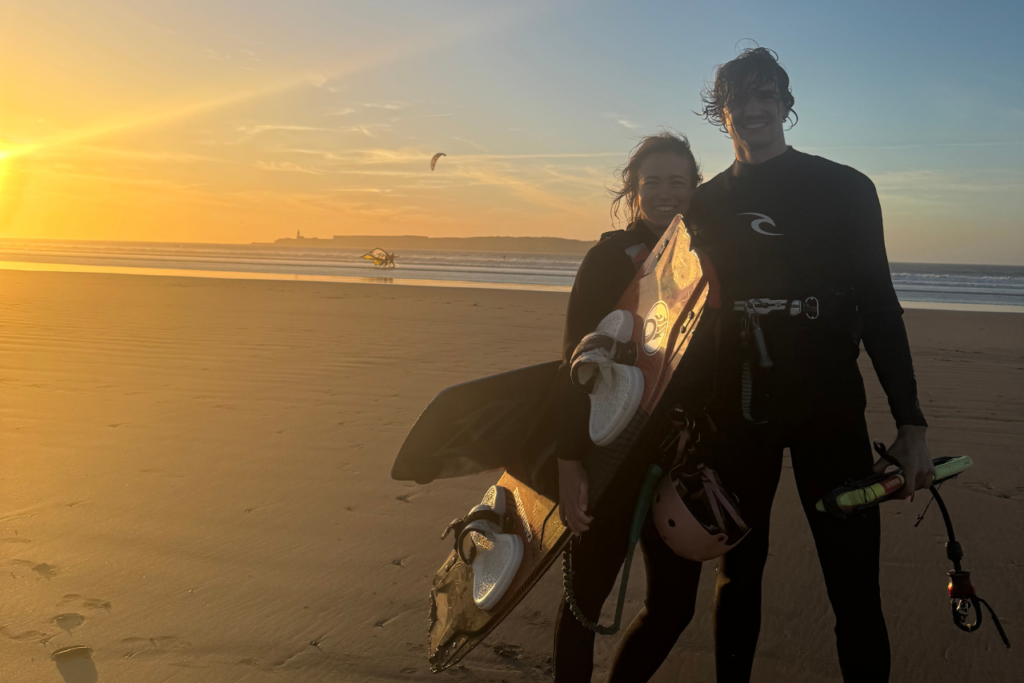 A couple smiling after their semi-private kitesurfing lesson in Essaouira.